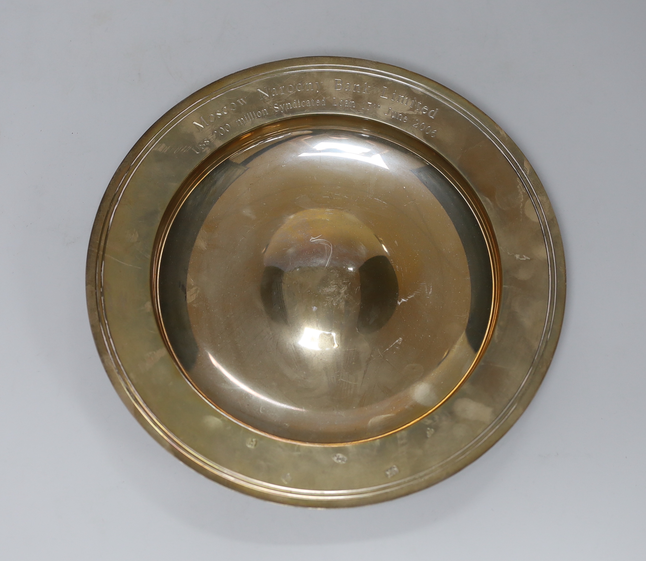 An Elizabeth II silver armada dish, with engraved inscription, J&SM, London, 2005, 25.5cm, 19.8oz.